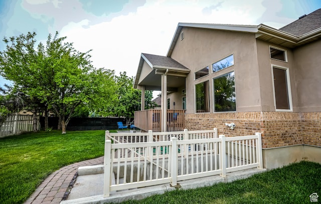 2817 S 1415 W, Syracuse, UT 84075 - rear view of house with stucco siding, brick siding, and a shingled roof