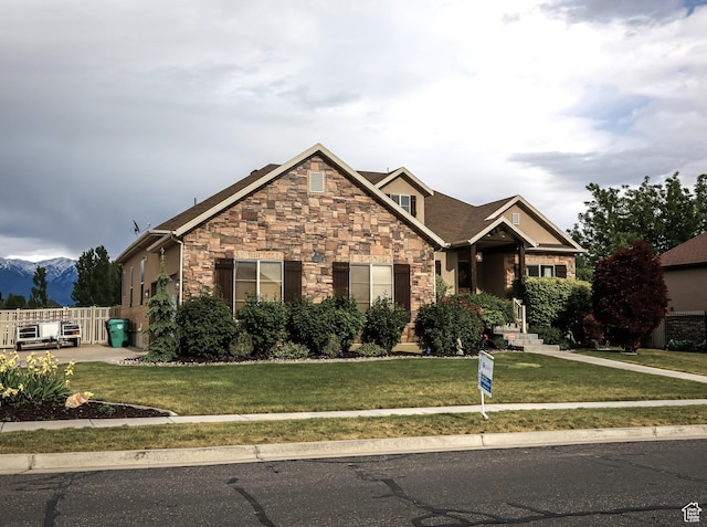 2817 S 1415 W, Syracuse, UT 84075 - craftsman-style home featuring stone siding and a mountain view