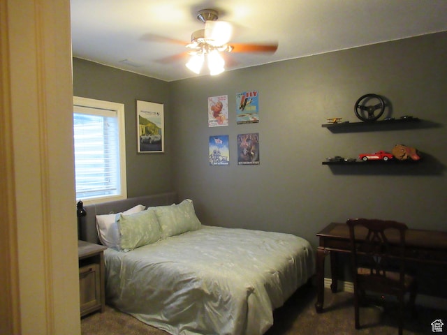carpeted bedroom with ceiling fan
