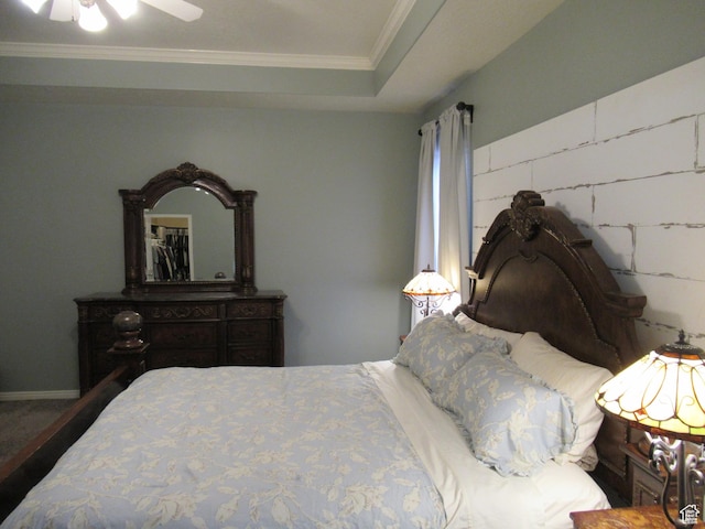 bedroom with crown molding and a ceiling fan