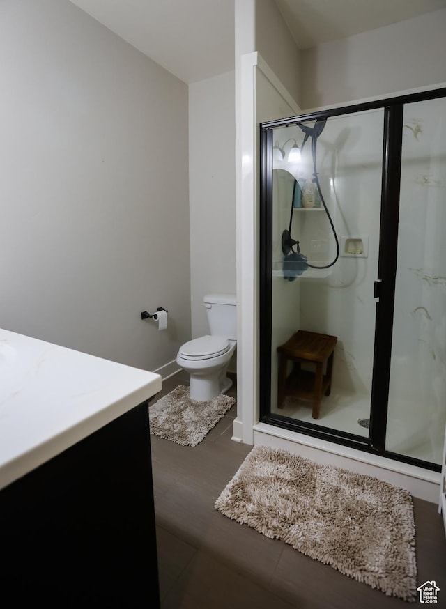 2817 S 1415 W, Syracuse, UT 84075 - full bathroom featuring vanity, toilet, a shower stall, and baseboards