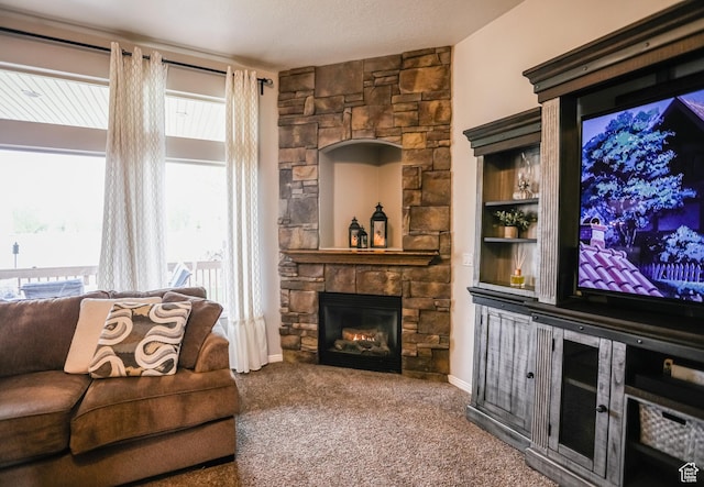 2817 S 1415 W, Syracuse, UT 84075 - living area featuring carpet and a stone fireplace