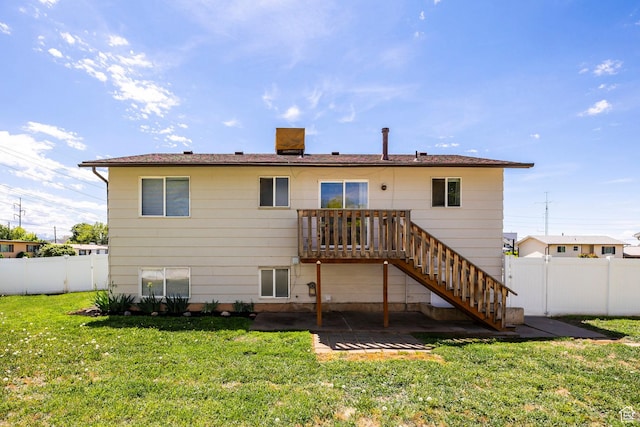 back of property with a patio, stairway, and a wooden deck
