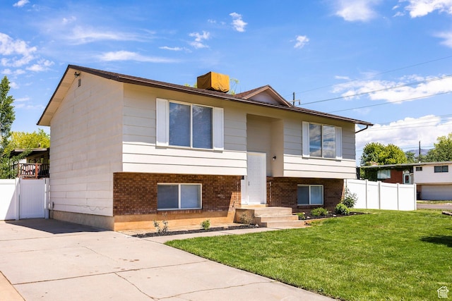 split foyer home with brick siding
