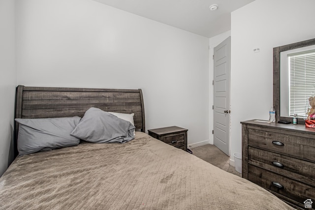 2994 S Tangent Peak Rd, Magna, UT 84044 - carpeted bedroom with baseboards