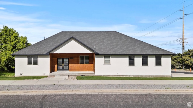 1885 N 2000 E, North Logan, UT 84341 - view of front of property with roof with shingles, french doors, covered porch, and stucco siding