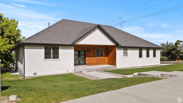 1885 N 2000 E, North Logan, UT 84341 - view of front of property featuring a front lawn, french doors, and a shingled roof