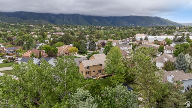 aerial view of residential area with mountains