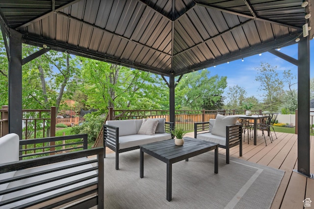 wooden deck featuring an outdoor hangout area and outdoor dining area