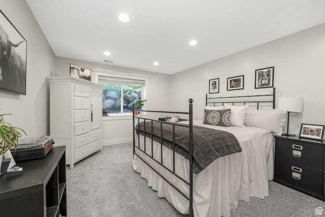 5982 N Rollins Ranch Rd W, Mountain Green, UT 84050 - bedroom featuring light colored carpet and recessed lighting
