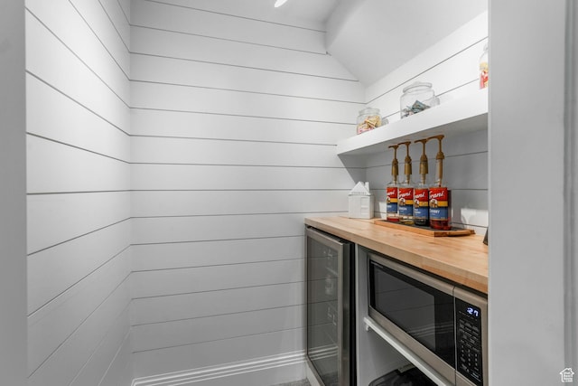 5982 N Rollins Ranch Rd W, Mountain Green, UT 84050 - indoor dry bar with beverage cooler and stainless steel microwave