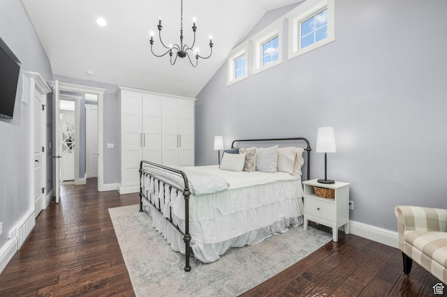 5982 N Rollins Ranch Rd W, Mountain Green, UT 84050 - bedroom with dark wood-type flooring, a chandelier, and high vaulted ceiling