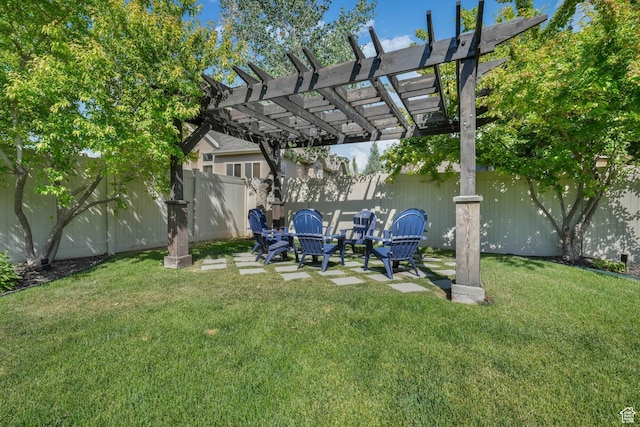 5982 N Rollins Ranch Rd W, Mountain Green, UT 84050 - fenced backyard featuring a pergola