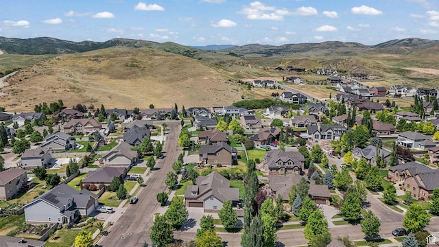 5982 N Rollins Ranch Rd W, Mountain Green, UT 84050 - aerial view of property's location with nearby suburban area and mountains