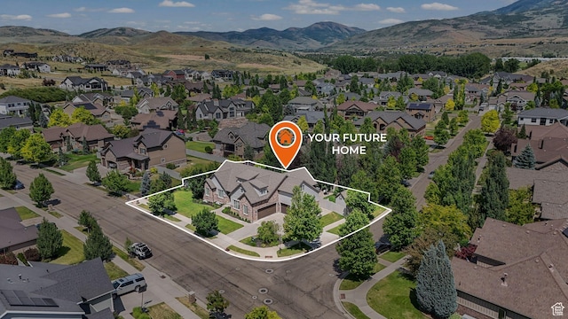 5982 N Rollins Ranch Rd W, Mountain Green, UT 84050 - aerial perspective of suburban area with property boundaries highlighted and a mountainous background