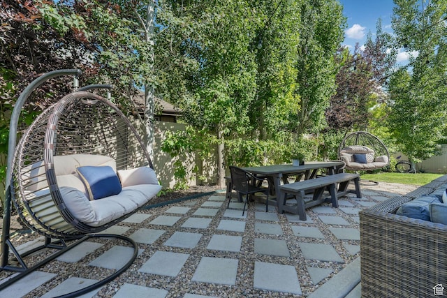 5982 N Rollins Ranch Rd W, Mountain Green, UT 84050 - view of patio / terrace featuring outdoor dining area