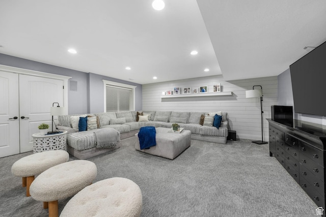 5982 N Rollins Ranch Rd W, Mountain Green, UT 84050 - carpeted living area with recessed lighting and wood walls