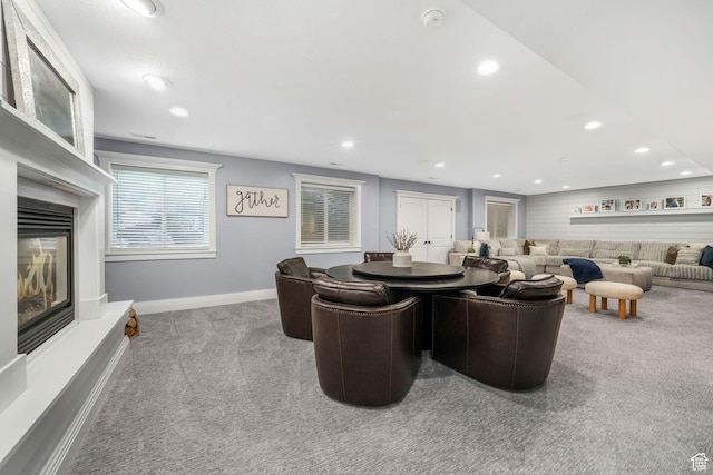 5982 N Rollins Ranch Rd W, Mountain Green, UT 84050 - carpeted living room with recessed lighting and a glass covered fireplace