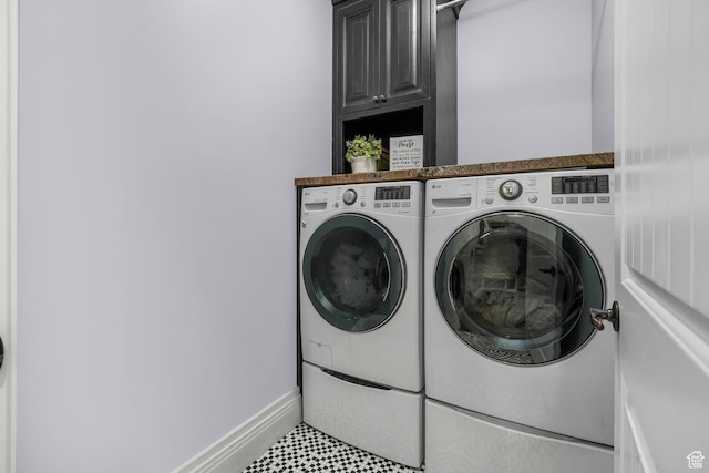 5982 N Rollins Ranch Rd W, Mountain Green, UT 84050 - laundry room with cabinet space and washer and dryer