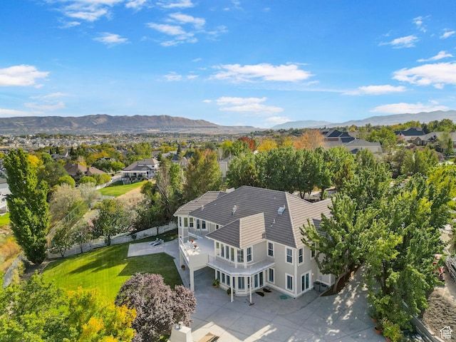 aerial view of residential area with a mountainous background
