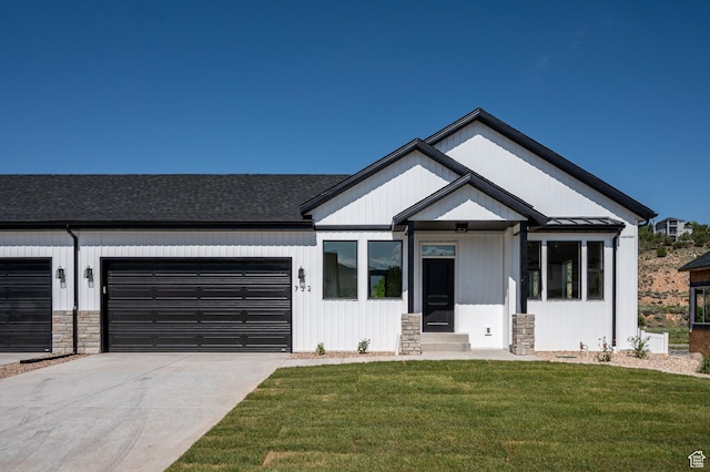 732 S Liberty Dr S, Cedar City, UT 84720 - modern inspired farmhouse with a garage, a shingled roof, a front yard, driveway, and stone siding