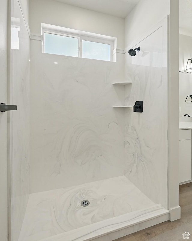 732 S Liberty Dr S, Cedar City, UT 84720 - full bath featuring a marble finish shower, vanity, and wood finished floors