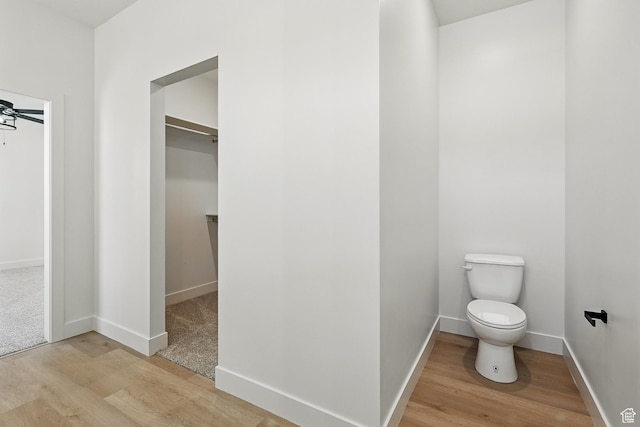 732 S Liberty Dr S, Cedar City, UT 84720 - bathroom with wood finished floors, toilet, and baseboards