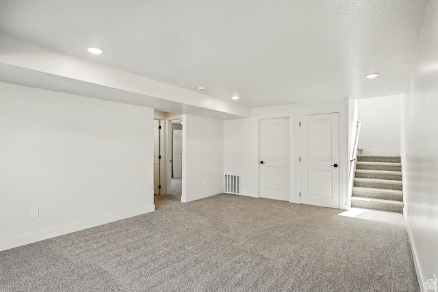 732 S Liberty Dr S, Cedar City, UT 84720 - finished below grade area with carpet floors, recessed lighting, baseboards, and stairway