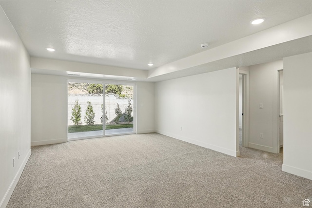 732 S Liberty Dr S, Cedar City, UT 84720 - carpeted empty room with baseboards, recessed lighting, and a textured ceiling