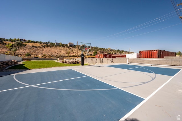 view of basketball court featuring basketball hoop