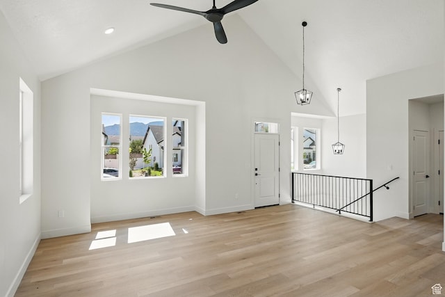732 S Liberty Dr S, Cedar City, UT 84720 - foyer with high vaulted ceiling, light wood-style flooring, baseboards, and a ceiling fan