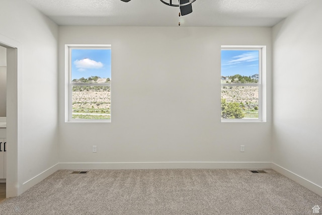 732 S Liberty Dr S, Cedar City, UT 84720 - unfurnished room with carpet, ceiling fan, baseboards, and a textured ceiling