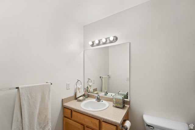half bath with toilet and vanity