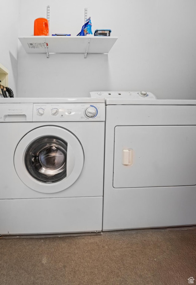 washroom with separate washer and dryer
