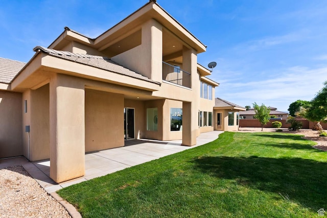 3134 S 355 W, Washington, UT 84780 - rear view of property with stucco siding, a balcony, and a patio area