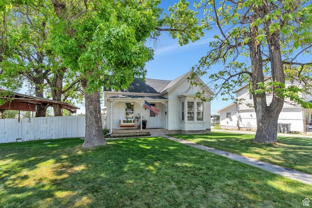 view of front of house with a shingled roof