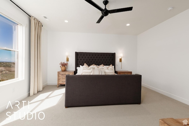bedroom featuring light colored carpet, baseboards, recessed lighting, and a ceiling fan