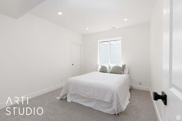 bedroom with carpet floors, baseboards, and recessed lighting