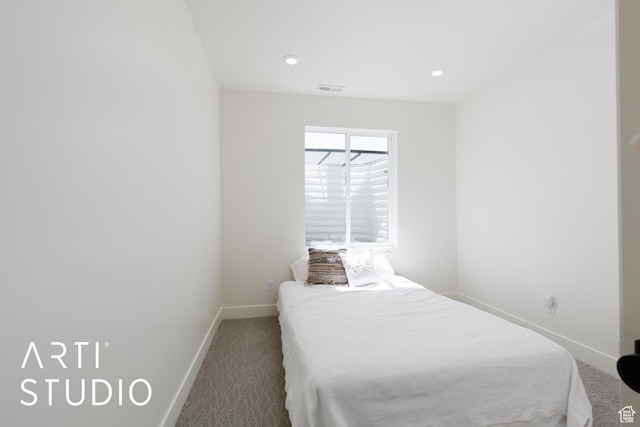 bedroom featuring carpet flooring, baseboards, and recessed lighting