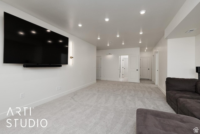 living area with light colored carpet, baseboards, and recessed lighting