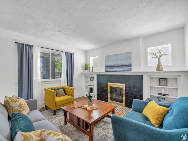 2829 S 900 E, Millcreek, UT 84106 - living room with a textured ceiling, a fireplace, and built in features