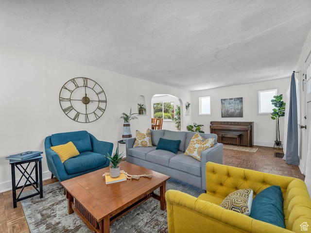 2829 S 900 E, Millcreek, UT 84106 - living area featuring a textured ceiling, a fireplace, and baseboards