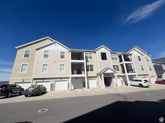 14643 S Mckellen Dr W Unit D302, Herriman, UT 84096 - view of front of house featuring a garage