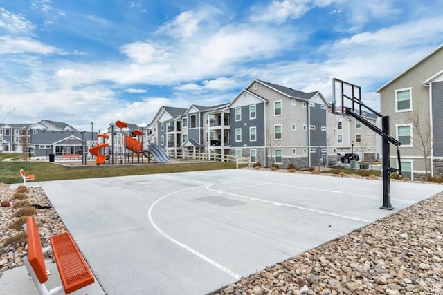 14643 S Mckellen Dr W Unit D302, Herriman, UT 84096 - view of basketball court featuring a residential view and community basketball court