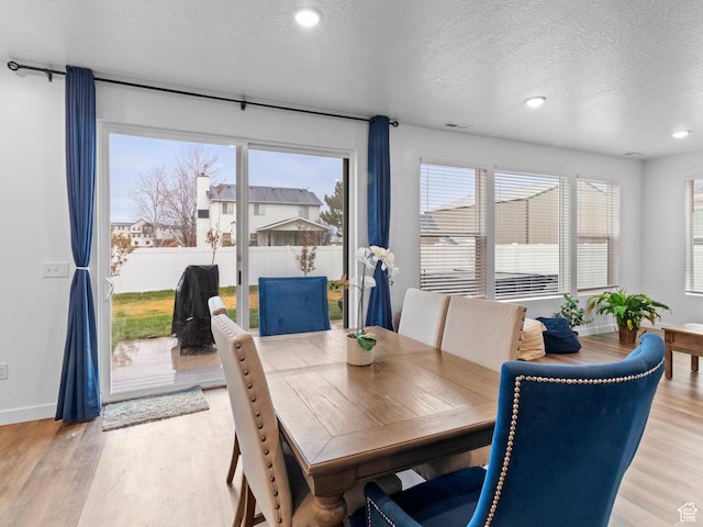 826 W 700 S, American Fork, UT 84003 - dining room featuring a textured ceiling, light wood finished floors, healthy amount of natural light, baseboards, and recessed lighting