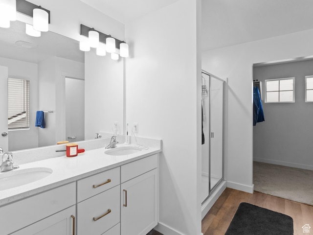 826 W 700 S, American Fork, UT 84003 - full bathroom with a stall shower, wood finished floors, double vanity, and baseboards