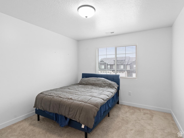 826 W 700 S, American Fork, UT 84003 - carpeted bedroom with a textured ceiling and baseboards
