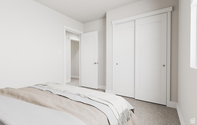1345 N 1390 E Unit 22-105, Payson, UT 84651 - bedroom featuring light carpet, baseboards, and a closet
