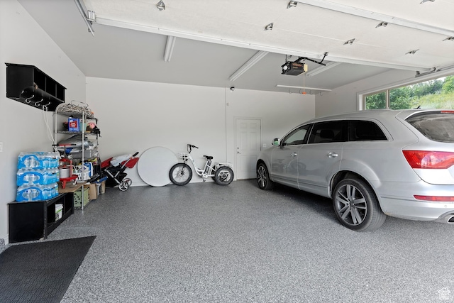 2333 S Falcon Way, Huntsville, UT 84317 - garage featuring a garage door opener