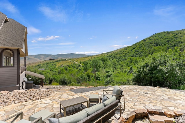 2333 S Falcon Way, Huntsville, UT 84317 - view of patio with a wooded view, an outdoor hangout area, and a mountain view